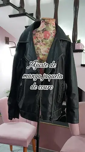 Jaqueta de couro com mangas ajustadas no ateliê